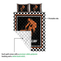 BMX quilt detail showing the printed rider design, checkerboard edge, and white quilt backing