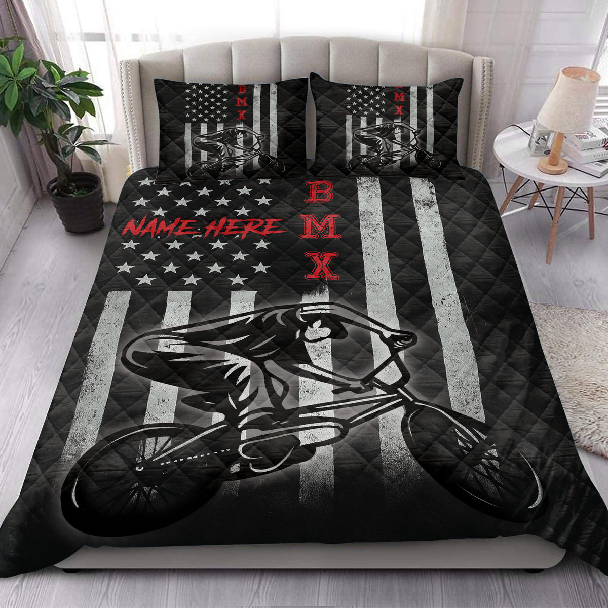 BMX rider quilt blanket styled on a bedroom bed with bold racing-inspired stripes and star graphics