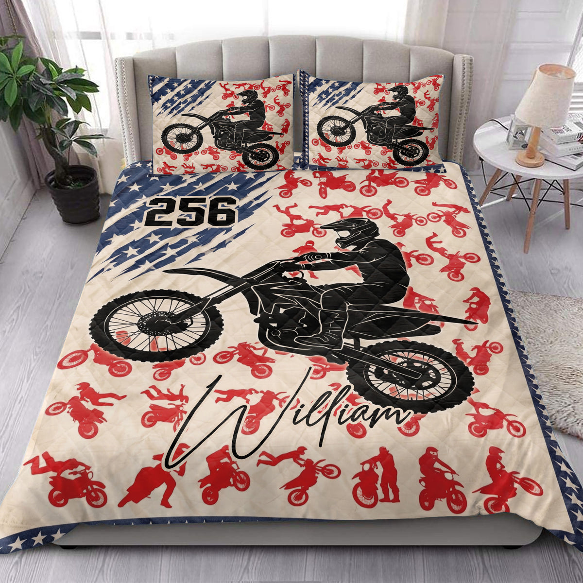 Motocross quilt blanket styled in a bedroom with large dirt bike rider artwork and red riding silhouettes