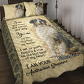 Australian Shepherd quilt blanket displayed on a bed with matching dog artwork and an ornate floral border