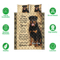 Rottweiler quilt bedding set shown with matching dog artwork, tan diamond quilting, and decorative black borders