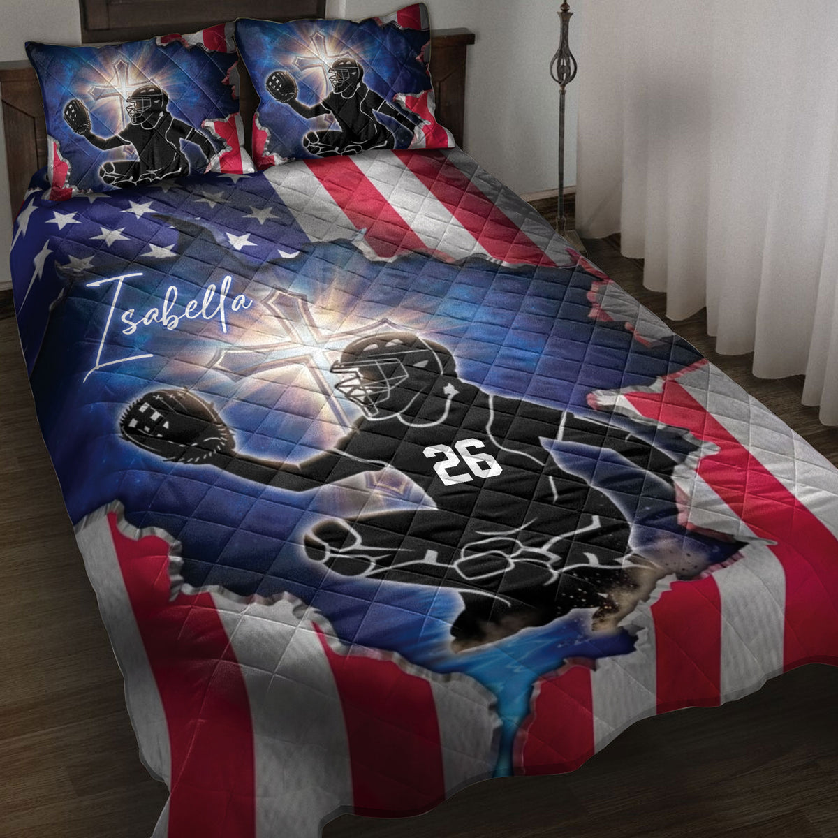 Softball catcher quilt blanket displayed on a bed with patriotic red, white, and blue sports artwork
