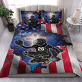 Softball catcher quilt blanket styled in a bright bedroom with matching sports artwork