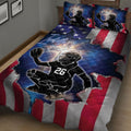 Close bedroom view of softball catcher quilt blanket with patriotic colors and action artwork