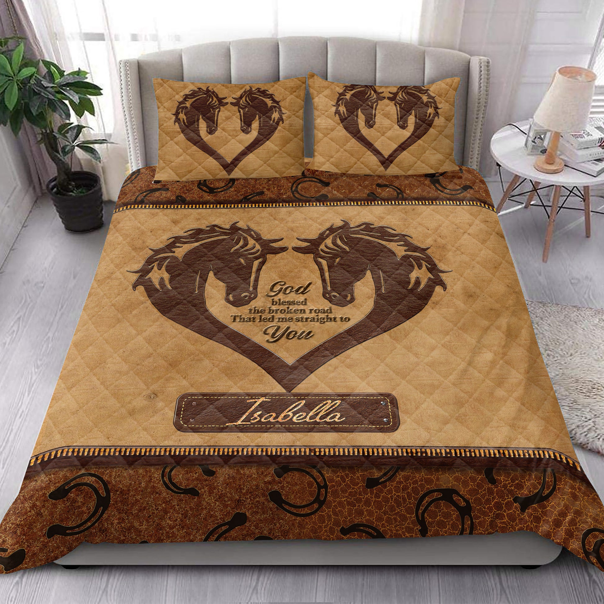 Horse quilt bedding set styled in a bright bedroom with matching horse heart artwork and rustic western details