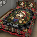 Close view of a husky Christmas quilt blanket with holly, gifts, pinecones, bells, and patchwork trim