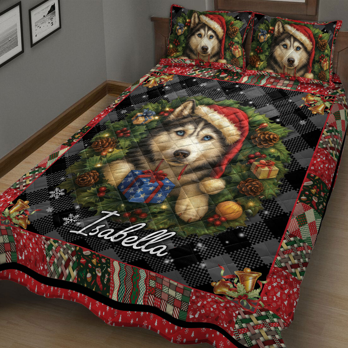 Close view of a husky Christmas quilt blanket with holly, gifts, pinecones, bells, and patchwork trim