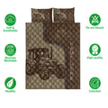 Tractor quilt bedding set shown flat with matching tractor artwork and brown diamond quilting