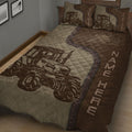 Close bedroom view of a brown tractor quilt with large farm machinery artwork