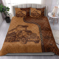 Dump truck quilt blanket styled in a bright bedroom with bold construction vehicle artwork