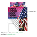 Close view of LGBT pride quilt showing the colorful printed side and white quilted backing