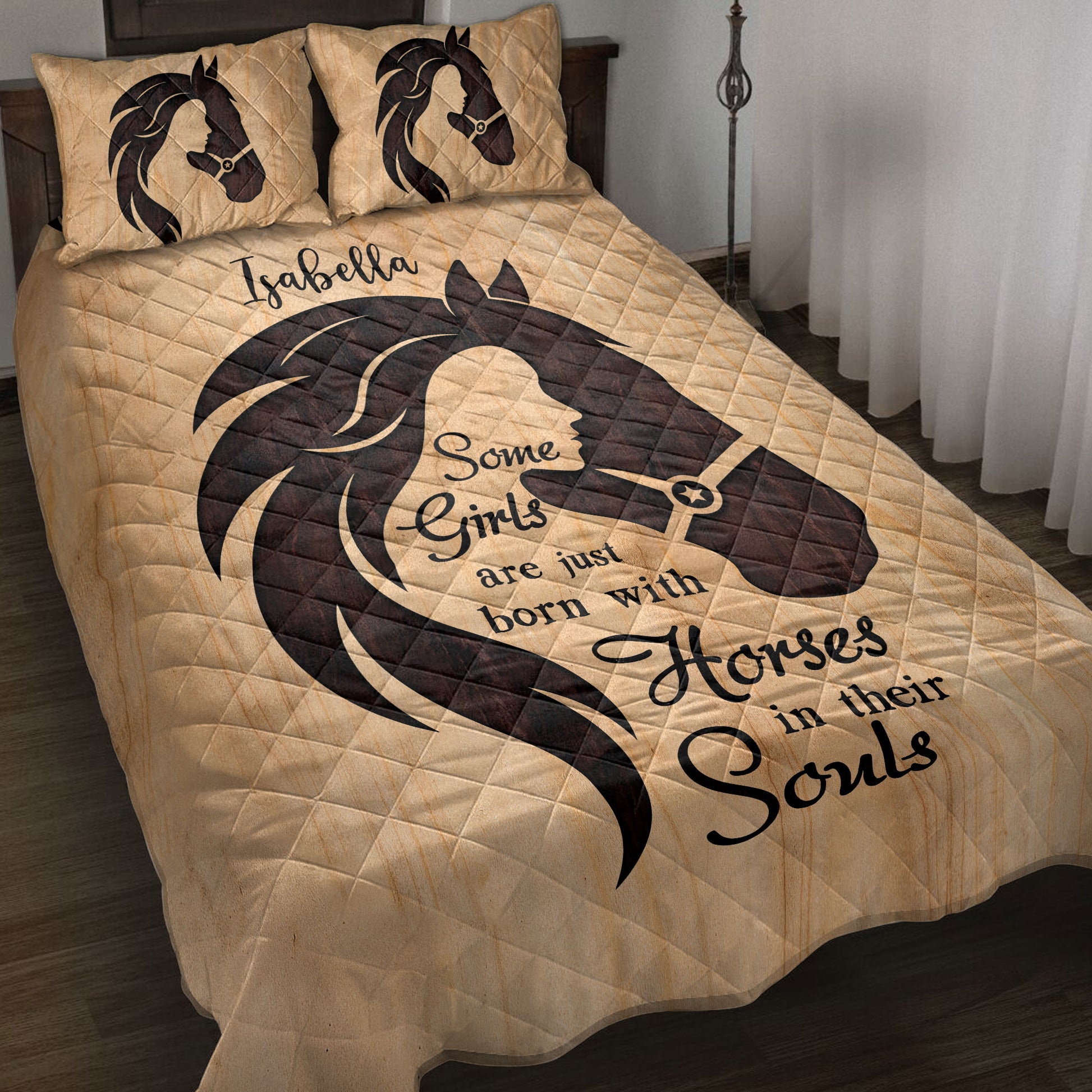Horse and girl silhouette quilt blanket styled on a bedroom bed with matching horse artwork on pillows