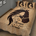 Close bedroom view of a horse and girl silhouette quilt blanket with dark equestrian artwork