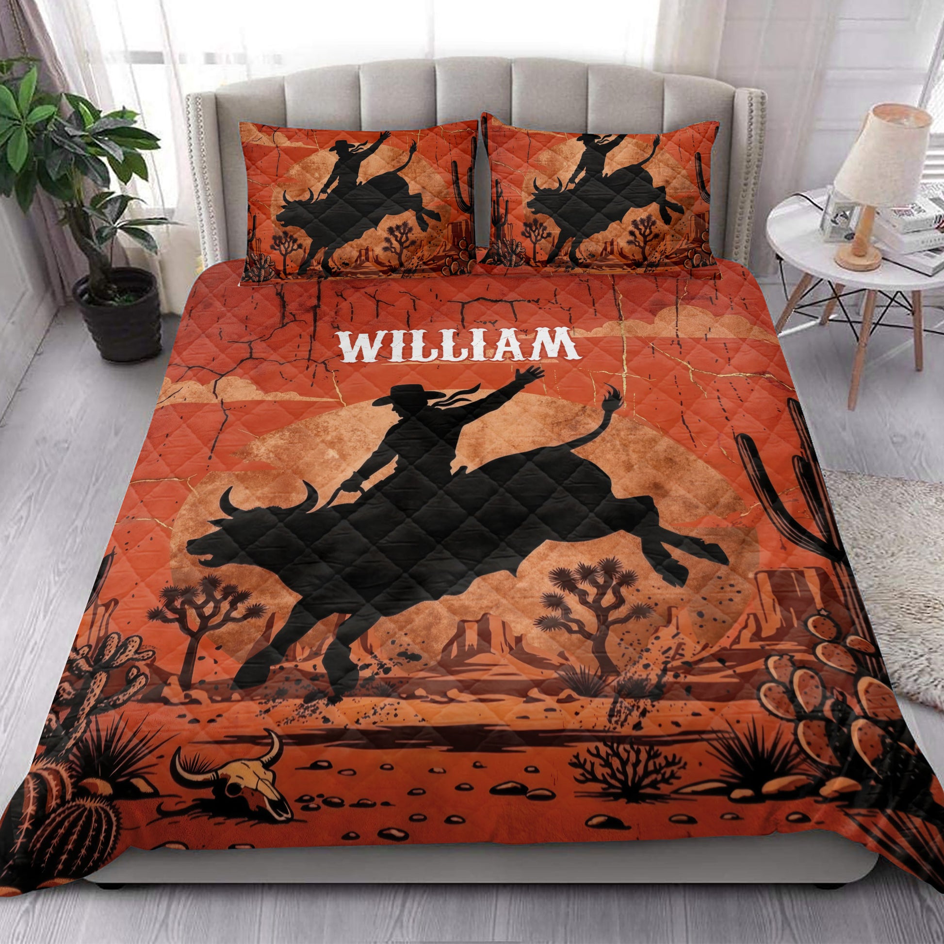 Rodeo quilt blanket styled in a bedroom with bull rider silhouettes, cacti, desert scenery, and western colors
