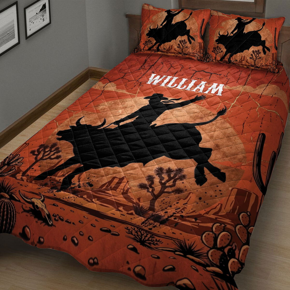 Close view of a rodeo quilt blanket featuring a bull rider silhouette, desert landscape, cacti, and western artwork
