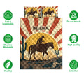 Rodeo quilt bedding set displayed with cowboy and horse silhouettes, cacti, desert colors, and western artwork
