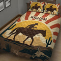 Close view of rodeo quilt blanket featuring a cowboy riding a horse, cacti, desert tones, and longhorn artwork