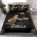 Softball quilt blanket styled in a bright bedroom with dramatic batter artwork and dark athletic decor