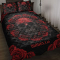 Black skull quilt blanket with ornate red roses displayed across a bedroom with matching pillows