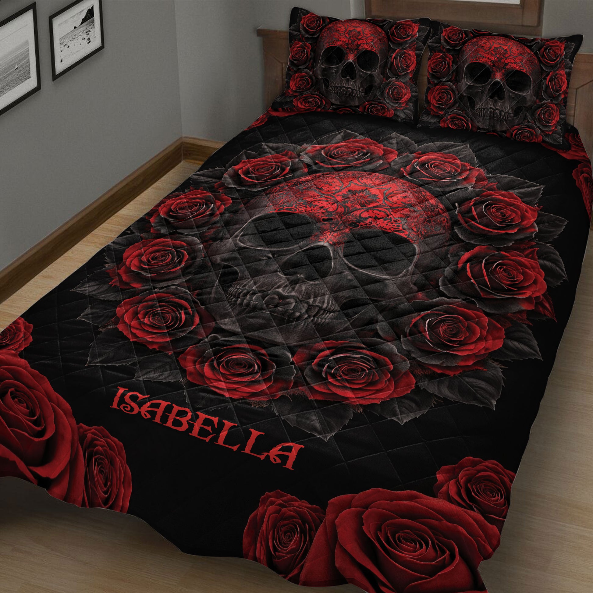 Close view of a black skull quilt blanket with dramatic red roses and matching skull pillows