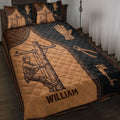 Lineman quilt blanket displayed on a bed with utility pole artwork, work gloves, tools, and brown black styling