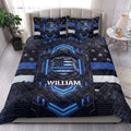 Police quilt blanket styled in a bedroom with blue shield artwork and patriotic stars