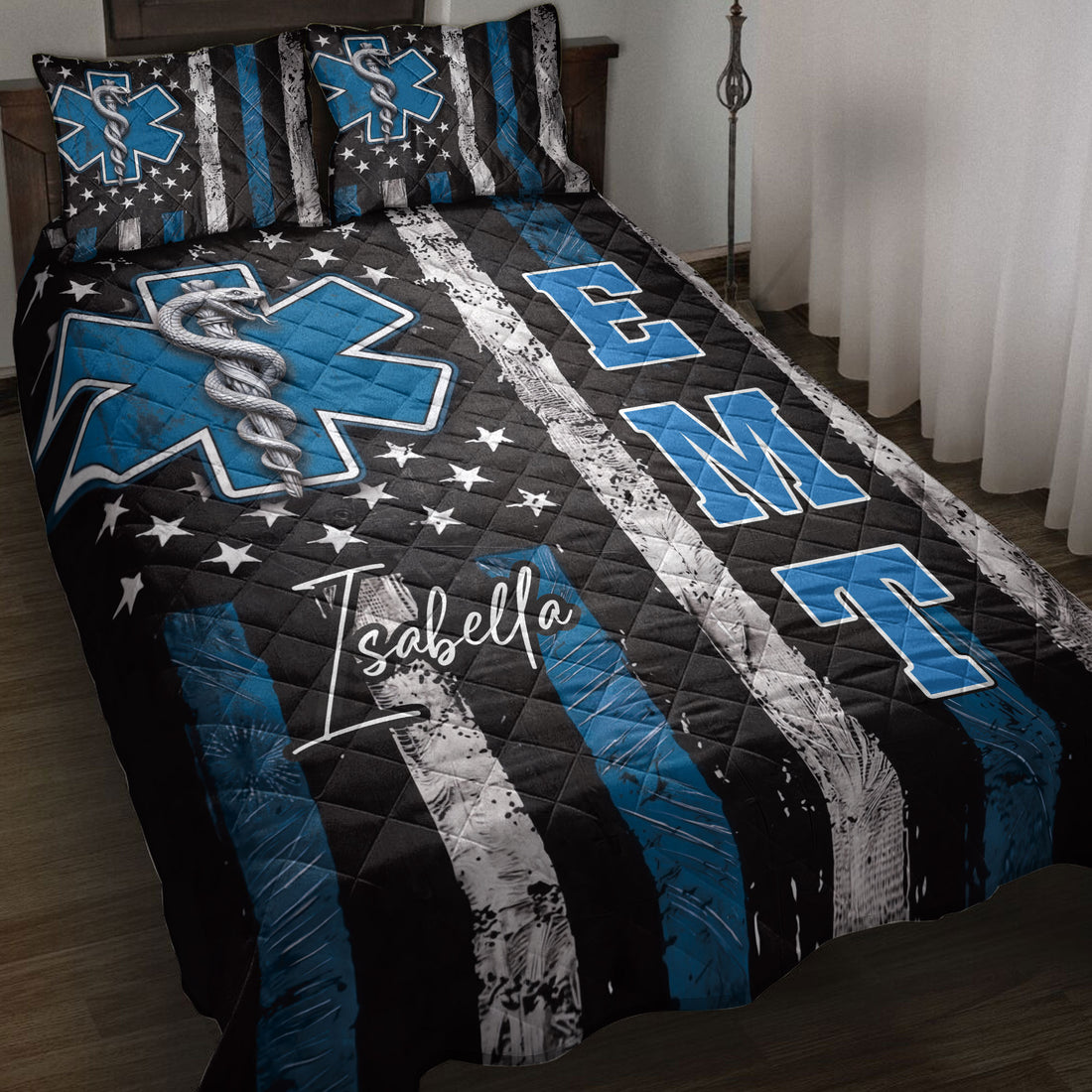 Paramedic quilt blanket displayed on a bed with blue Star of Life symbols, medical caduceus artwork, and stars