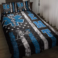 Paramedic quilt blanket displayed on a bed with blue Star of Life symbols, medical caduceus artwork, and stars