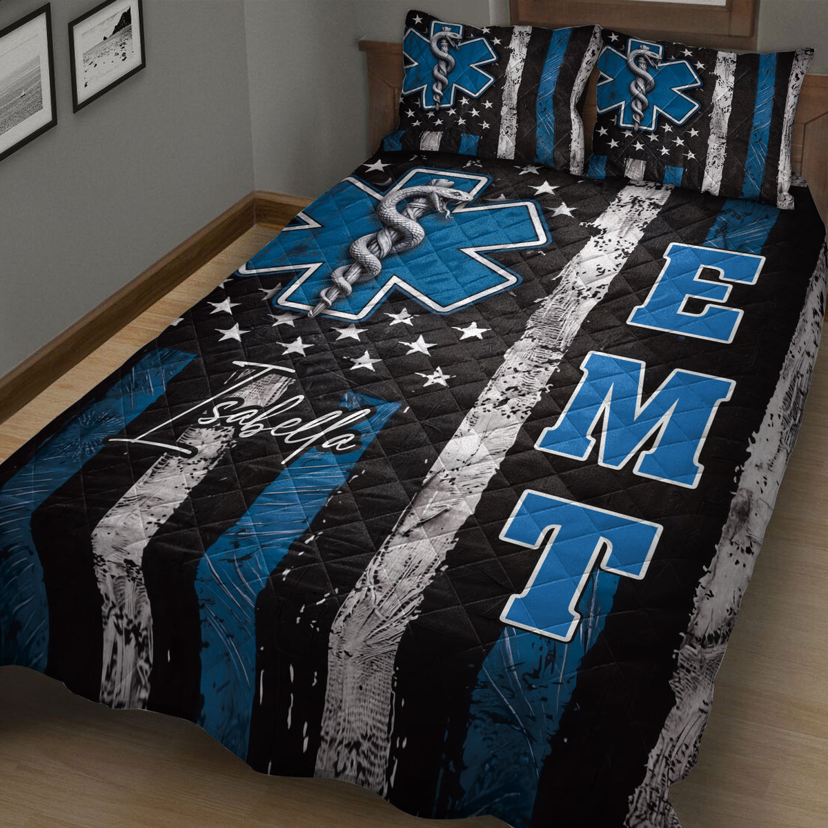 Close bedroom view of a paramedic quilt with Star of Life symbols, caduceus artwork, stars, and blue accents