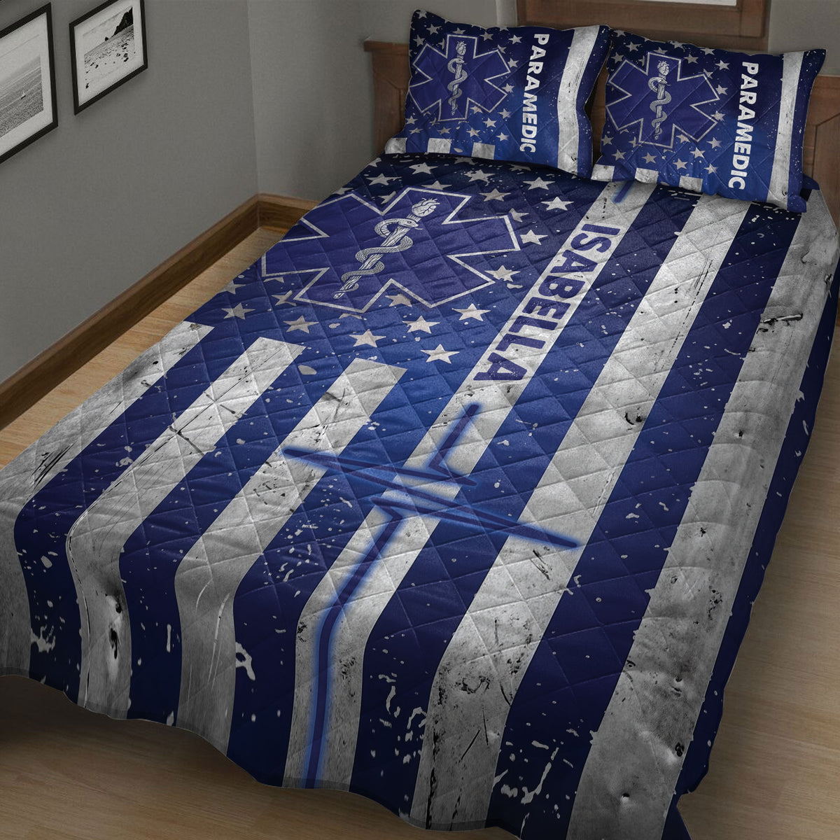 Navy paramedic quilt blanket displayed on a bedroom bed with stars, medical emblems, and bold silver stripes