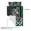 Motocross quilt showing a dirt bike rider design, printed front, and quilted white backing