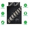 Racing quilt blanket set with bold checkered flag design shown with product feature icons