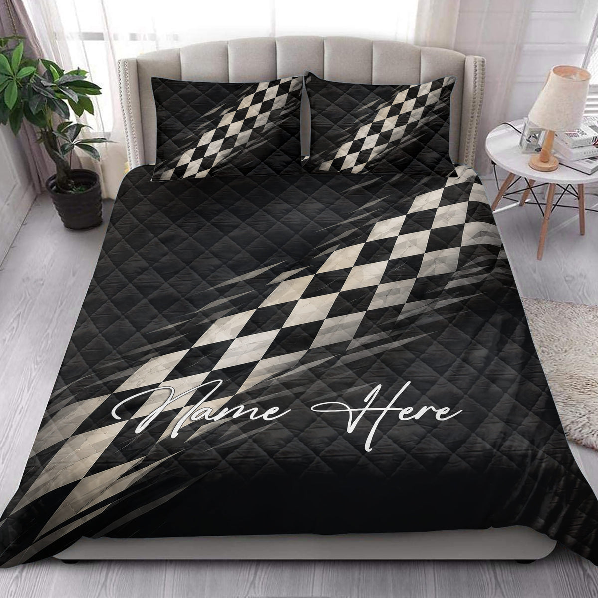 Checkered flag racing quilt blanket styled across a modern bedroom with matching bedding