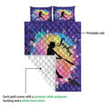 Softball quilt blanket showing the colorful printed front and quilted white backing detail