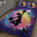 Purple cheerleading quilt featuring a jumping cheerleader silhouette and rainbow paint-splash design
