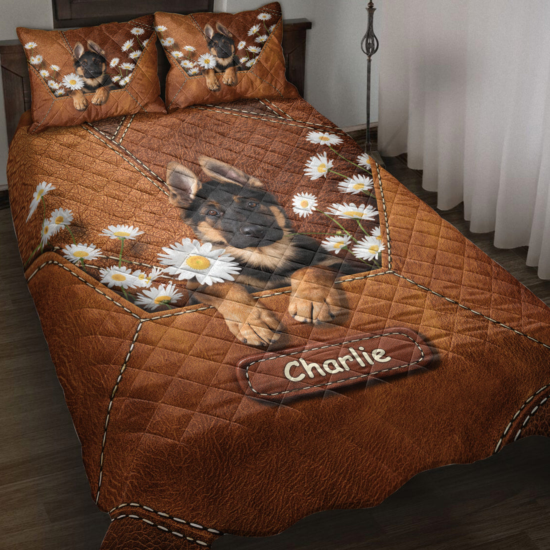 German Shepherd quilt blanket displayed on a bed with puppy portraits, daisies, and warm brown patchwork artwork