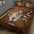 Rustic English Bulldog quilt blanket spread across a bed with floral artwork