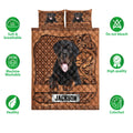 Rottweiler quilt bedding set shown front-facing with brown decorative artwork and product feature icons