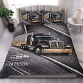 Trucker quilt bedding styled in a bedroom with bold black and gold semi-truck artwork