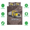 Yellow semi-truck quilt bedding set displayed with soft breathable and care feature icons
