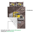 Trucker quilt bedding set showing the printed front, quilted reverse, and semi-truck artwork