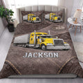 Trucker quilt blanket styled in a bedroom with yellow semi-trucks and road-themed artwork