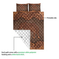 Elephant quilt blanket showing the printed front, white quilted backing, and stitched construction