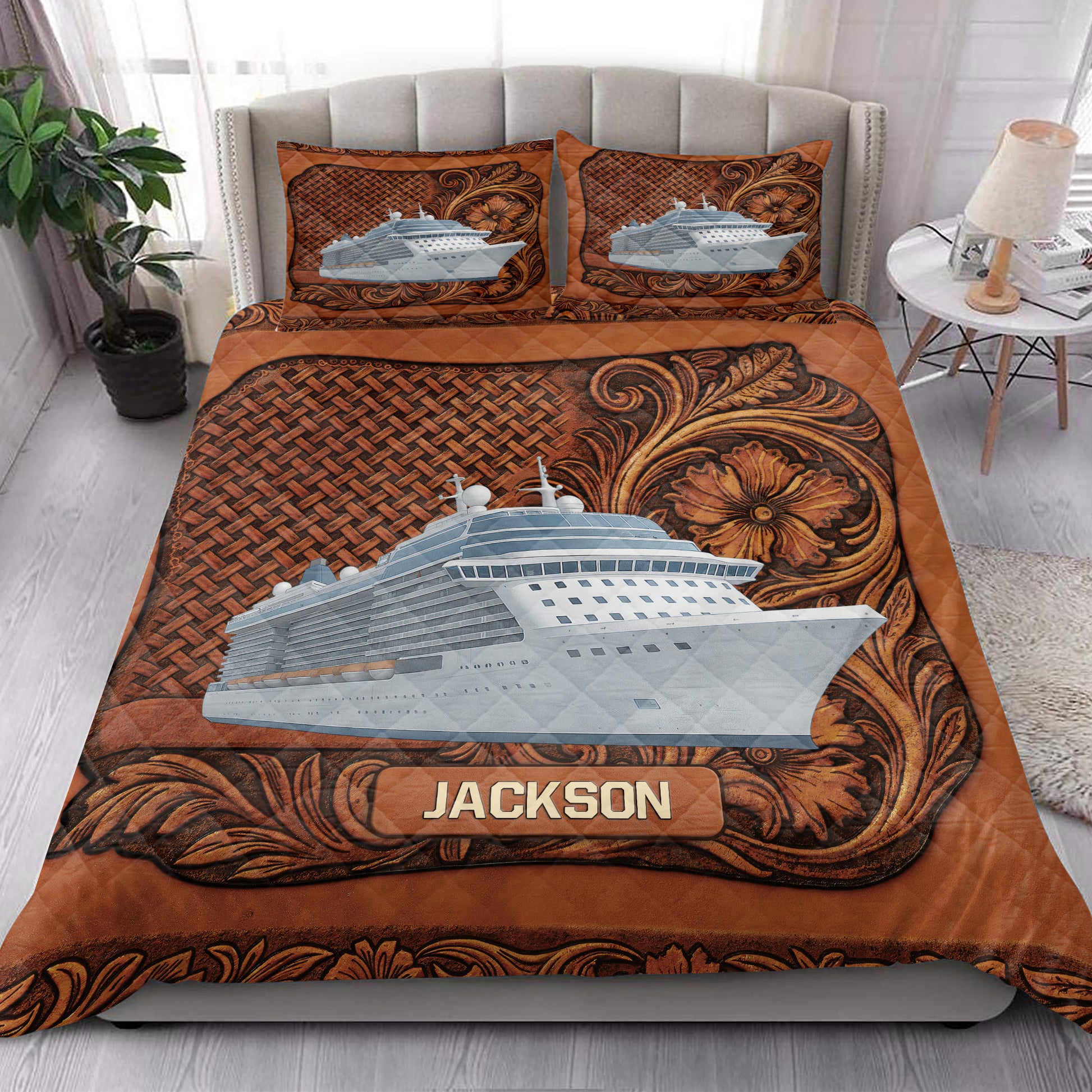 Cruise ship quilt bedding styled in a bright bedroom with ornate brown floral borders
