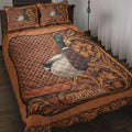Rustic hunting quilt blanket featuring a mallard duck, woven texture, floral scrollwork, and warm brown tones