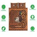Mallard duck quilt bedding set shown front-facing with ornate floral artwork and warm copper-brown colors