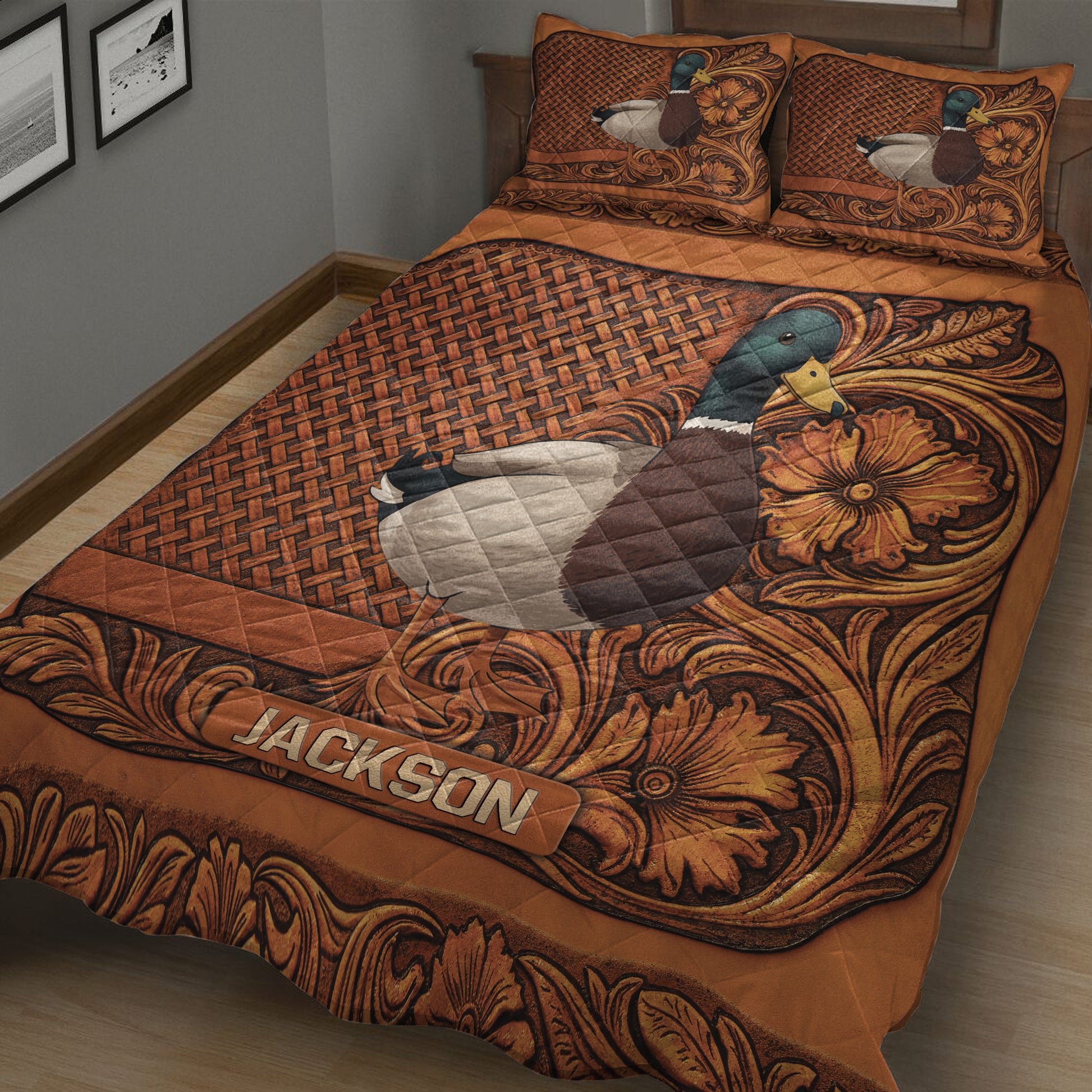 Close bedroom view of a mallard duck quilt blanket with rustic woven texture and decorative floral scrollwork