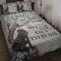Cane Corso quilt blanket displayed on a bed with floral branches and a dark dog portrait