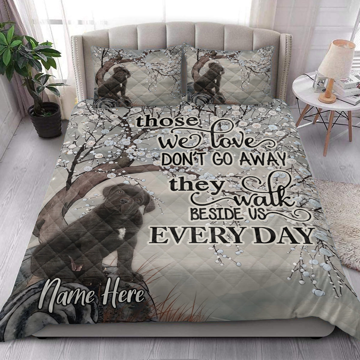 Cane Corso quilt blanket styled on a modern bed with matching dog artwork on the pillows