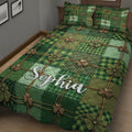 Irish quilt blanket on a bed featuring green patchwork tartan and repeating shamrocks